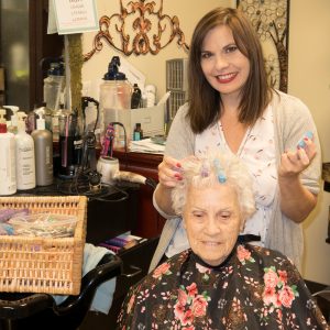 Maranatha Village resident getting hair done at on-site salon