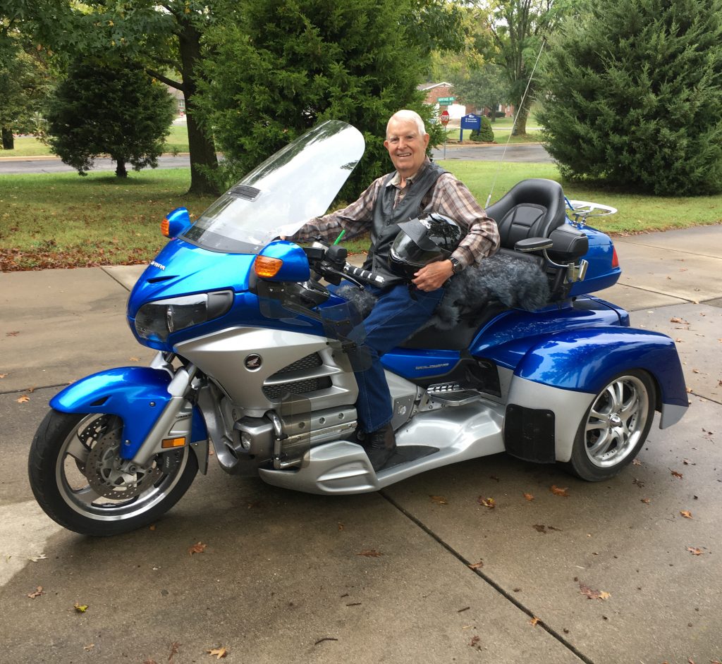 Retirement community resident riding motorcycle