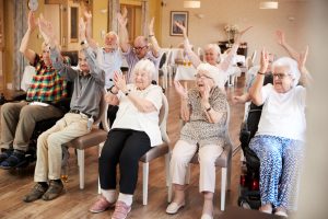 Senior citizens having fun at assisted living